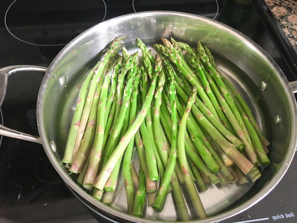 asparagus in a saute pan.