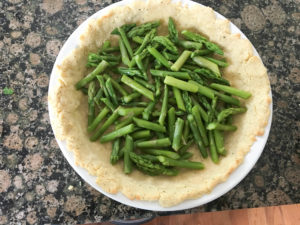 keto quiche crust with asparagus added.