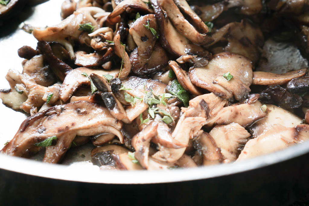Add in the chopped sage and fresh thyme. Both herbs pair beautifully with wild mushrooms.